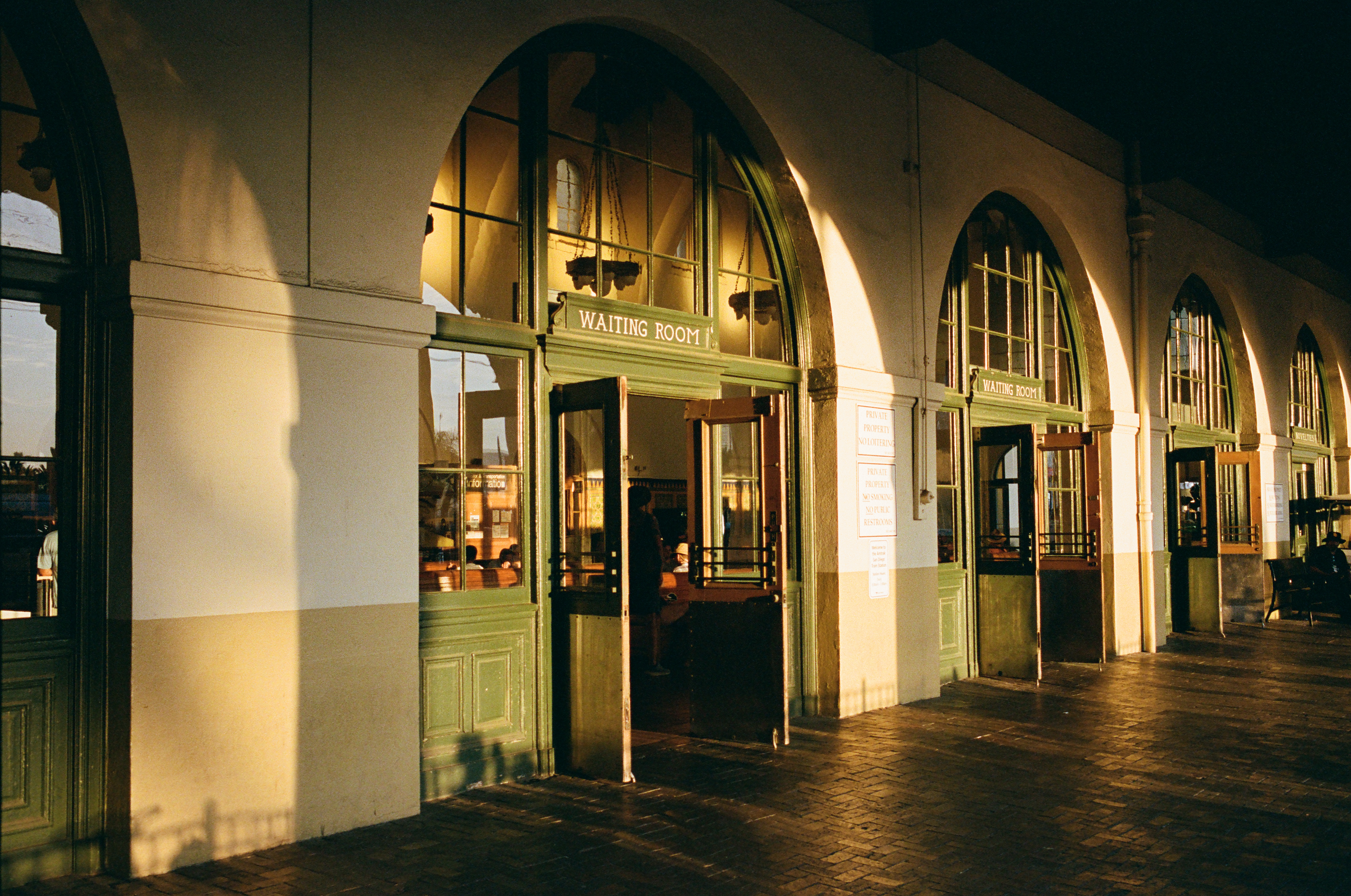 A photo shows the entrance to a waiting room at an Amtrak station in San Diego, CA.