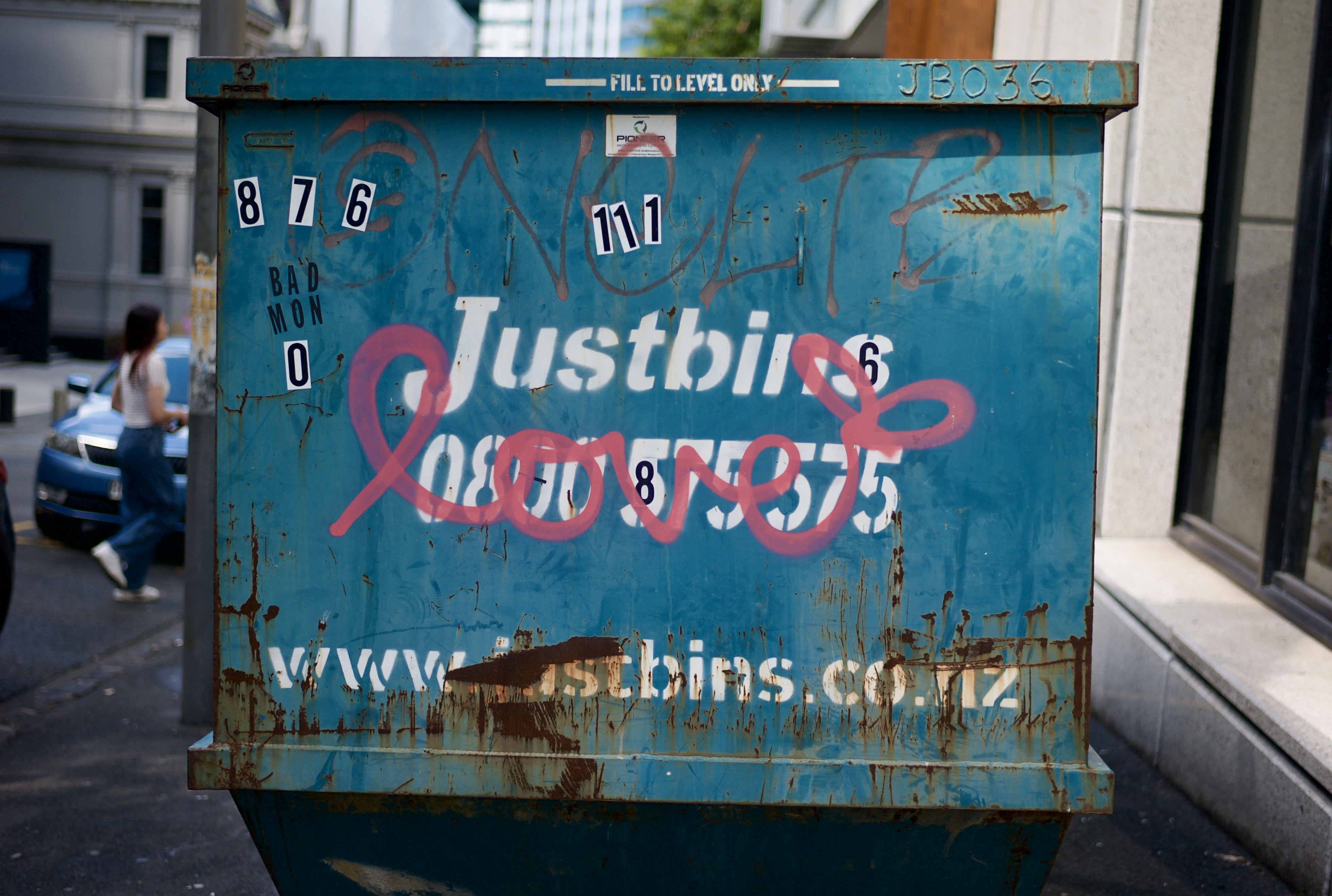 A rubbish bin shows LOVE in a beautiful pink cursive.